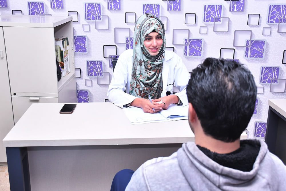 A clinical psychologist counselling a client at Safe Care Trust International, Islamabad