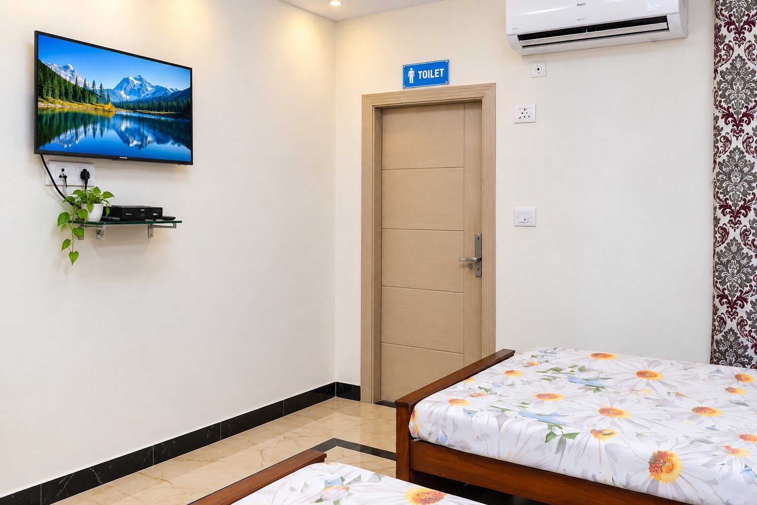 Air-conditioned patient room with a television at SCTI rehab centre in Islamabad